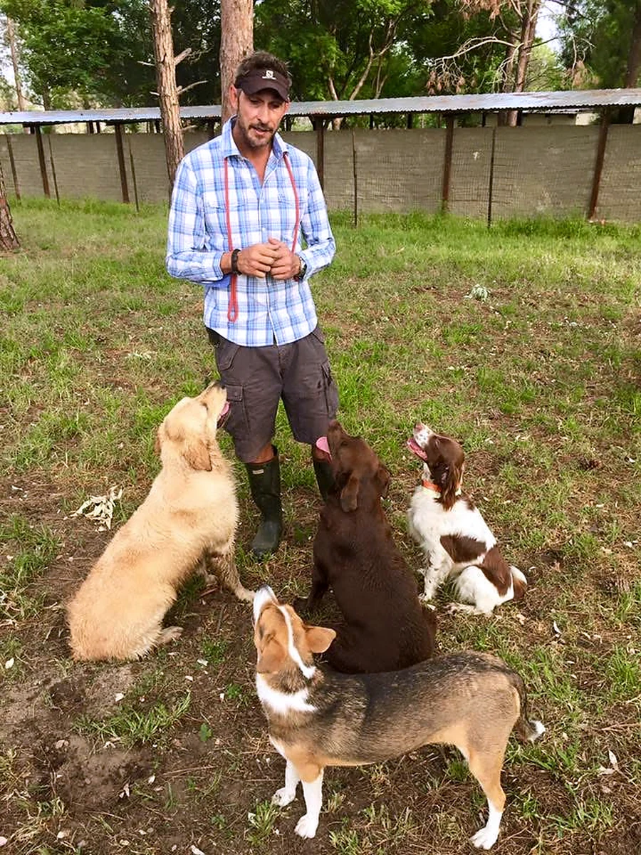 Gareth with dogs on the property during day-to-day working life